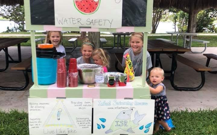 5 kids at Watermelon Safety Stand